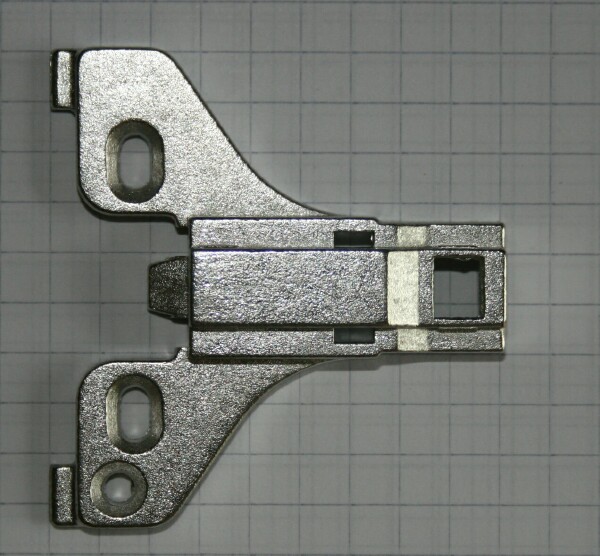 Typical long arm or clip on concealed hinge face frame mounting plate